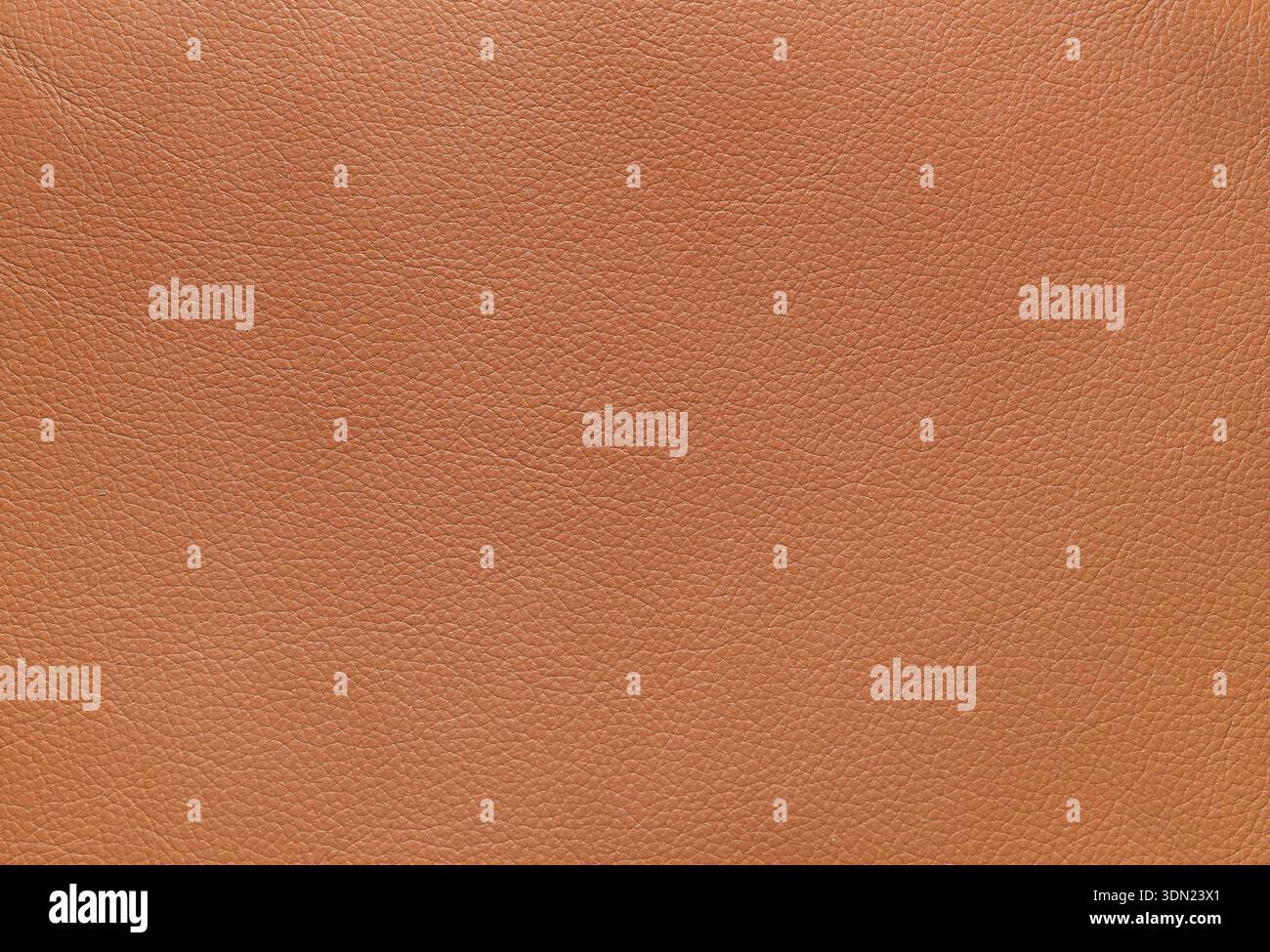 Genuine orange brown natural leather texture background. Stock Photo