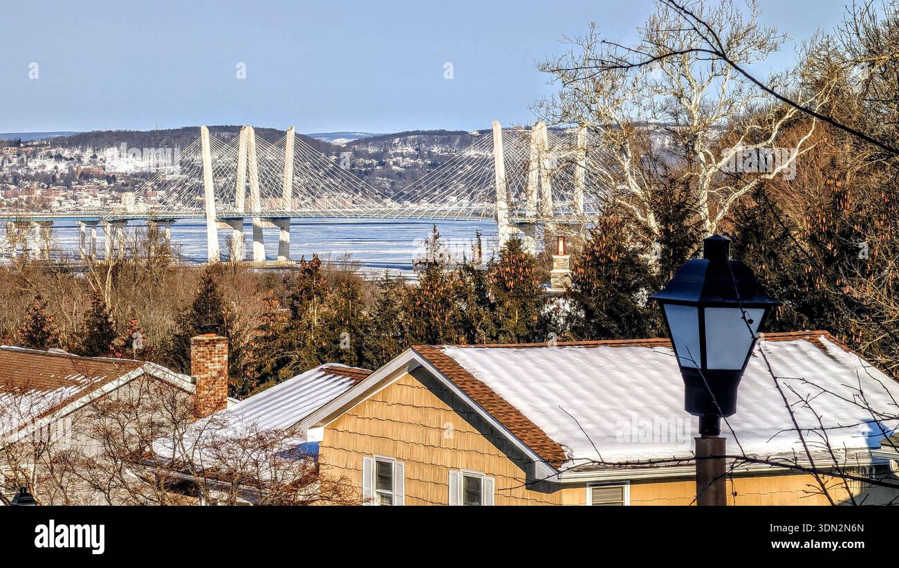 The Mario Cuomo bridge seen spanning the frozen Hudson River between Tarrytown and South Nyack - Smartphone Captured Stock Image