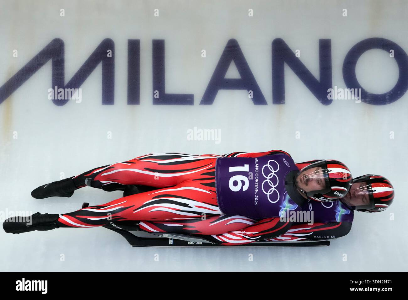 Austria's Thomas Steu, left, and Wolfgang Kindl, right, slide down the ...