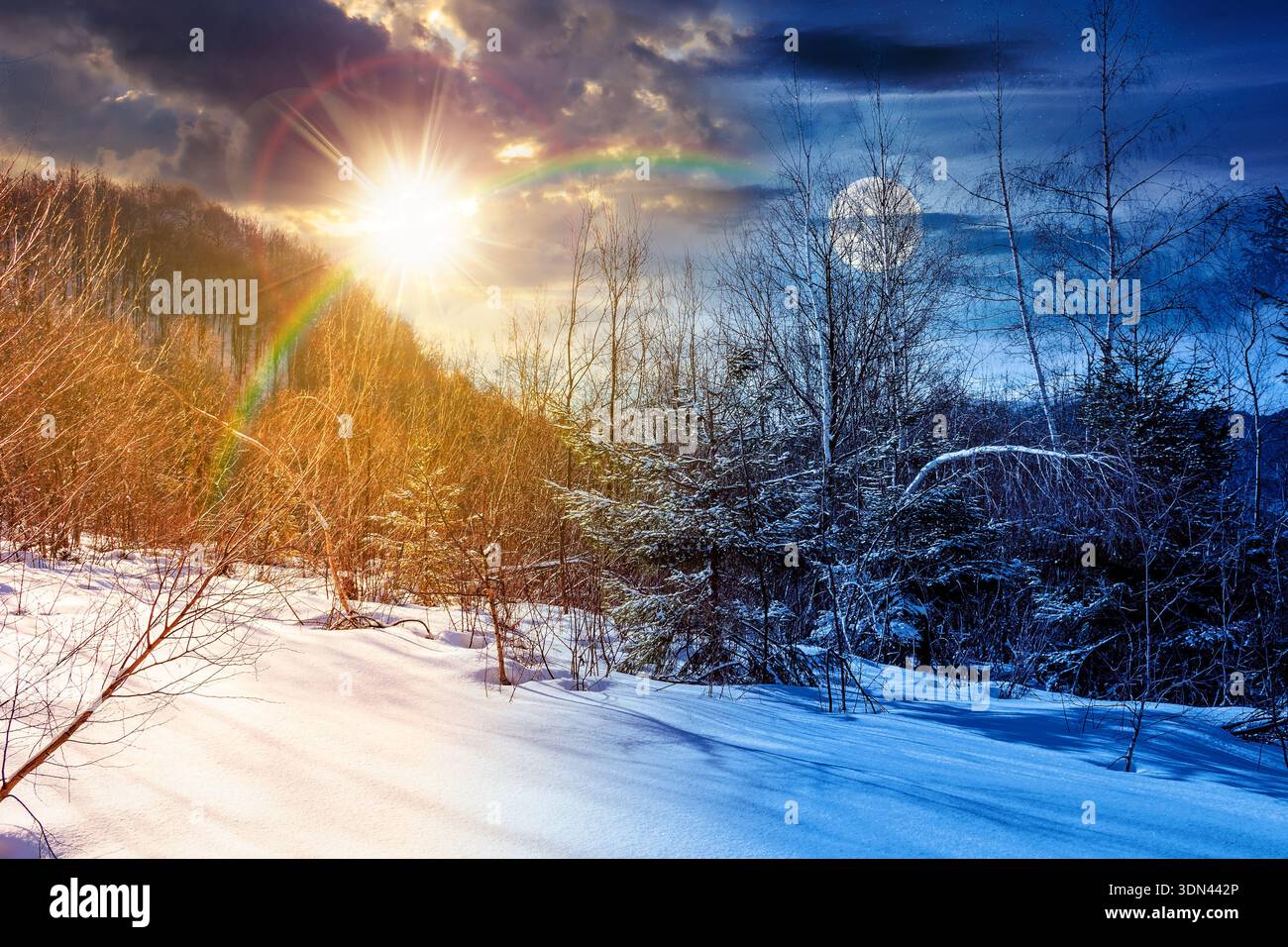 winter solstice landscape. day and night time change concept. deciduous forest on snow covered hill with sun and moon at twilight. beautiful scenery u Stock Photo