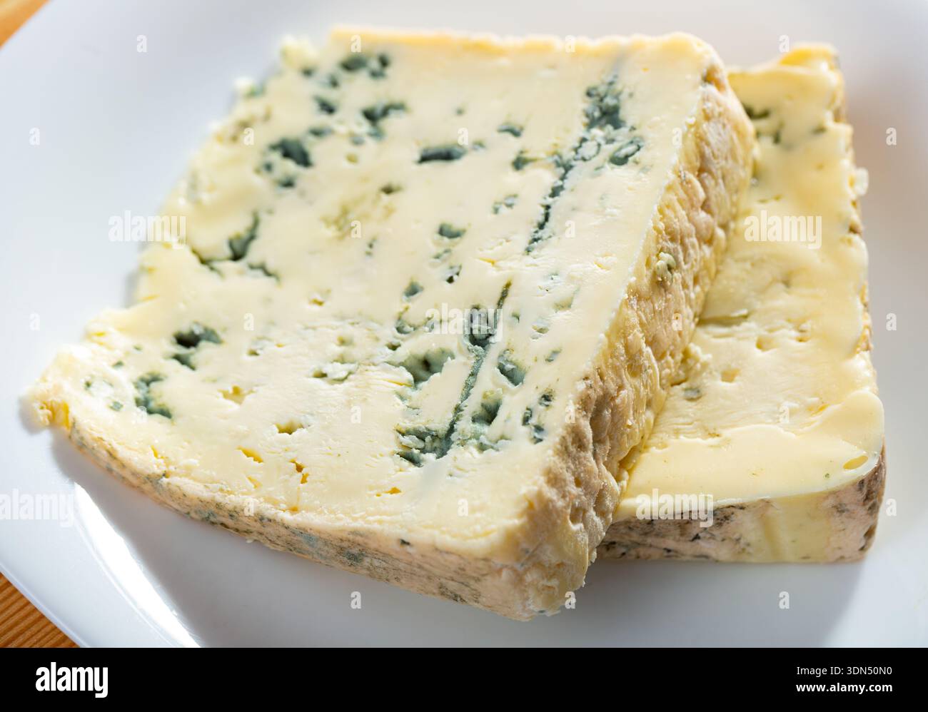 Blue cheese on plate Stock Photo