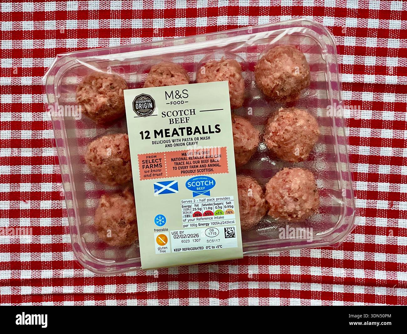A sealed plastic tray of Marks and Spencer Scotch beef Meatballs - Smartphone Captured Stock Image
