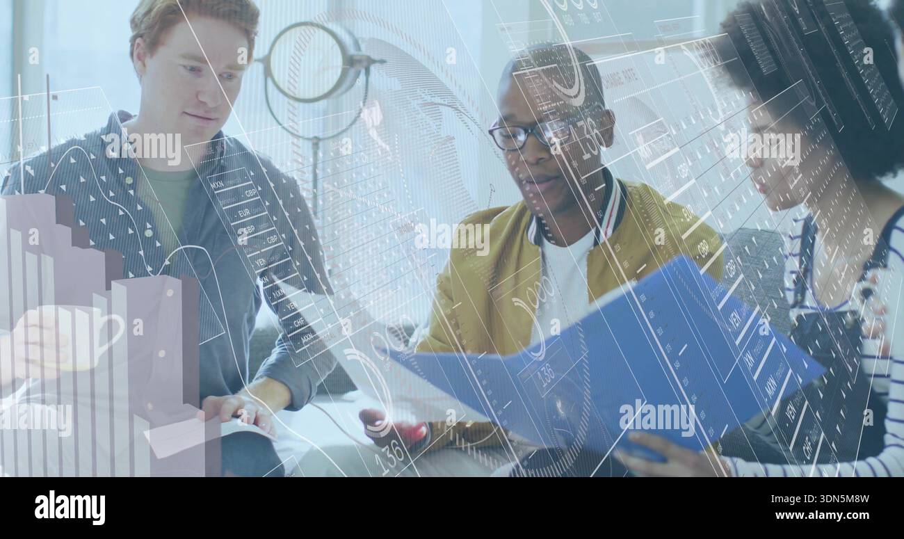 Reviewing three-person team in casual wear leaning over blue folder in office viewing data overlays Stock Photo