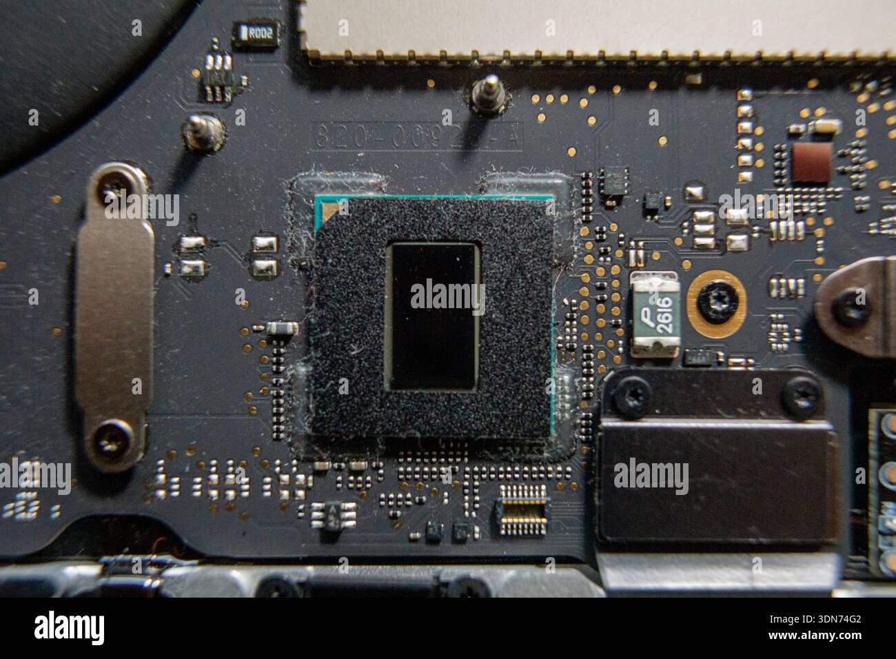 Central processor chip mounted on motherboard Stock Photo - Alamy