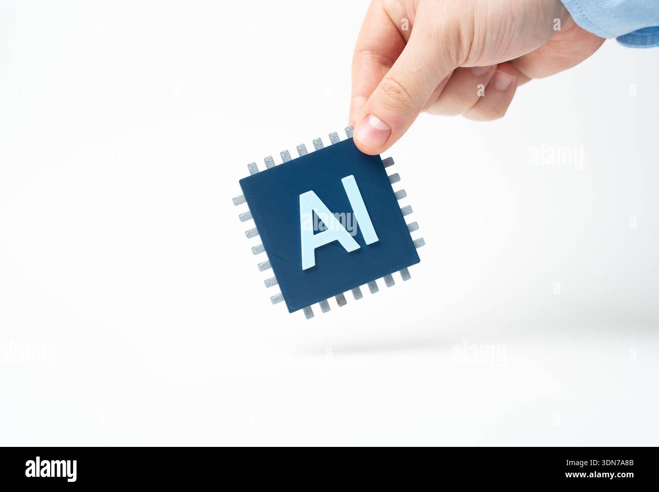 AI chip in hand. Computer Microchip with Artificial Intelligence. Advanced semiconductor symbolizes innovation. High tech hardware powers data, automa Stock Photo