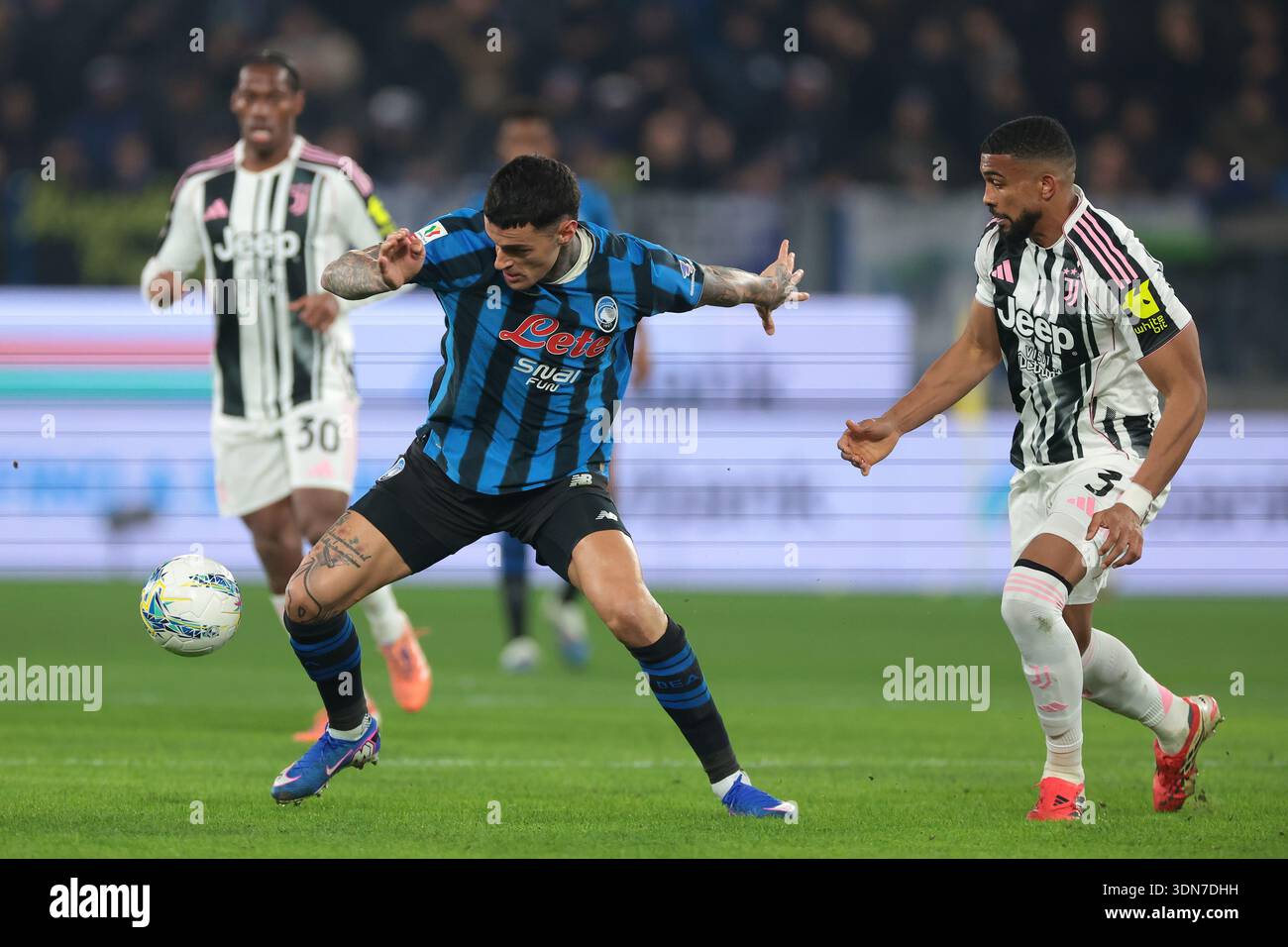 Bergamo, Italy, 5th February 2026. Gianluca Scamacca of Atalanta controls  the ball under pressure from Gleison Bremer of Juventus during the Atalanta  vs Juventus Coppa Italia match at New Balance Arena, Bergamo.
