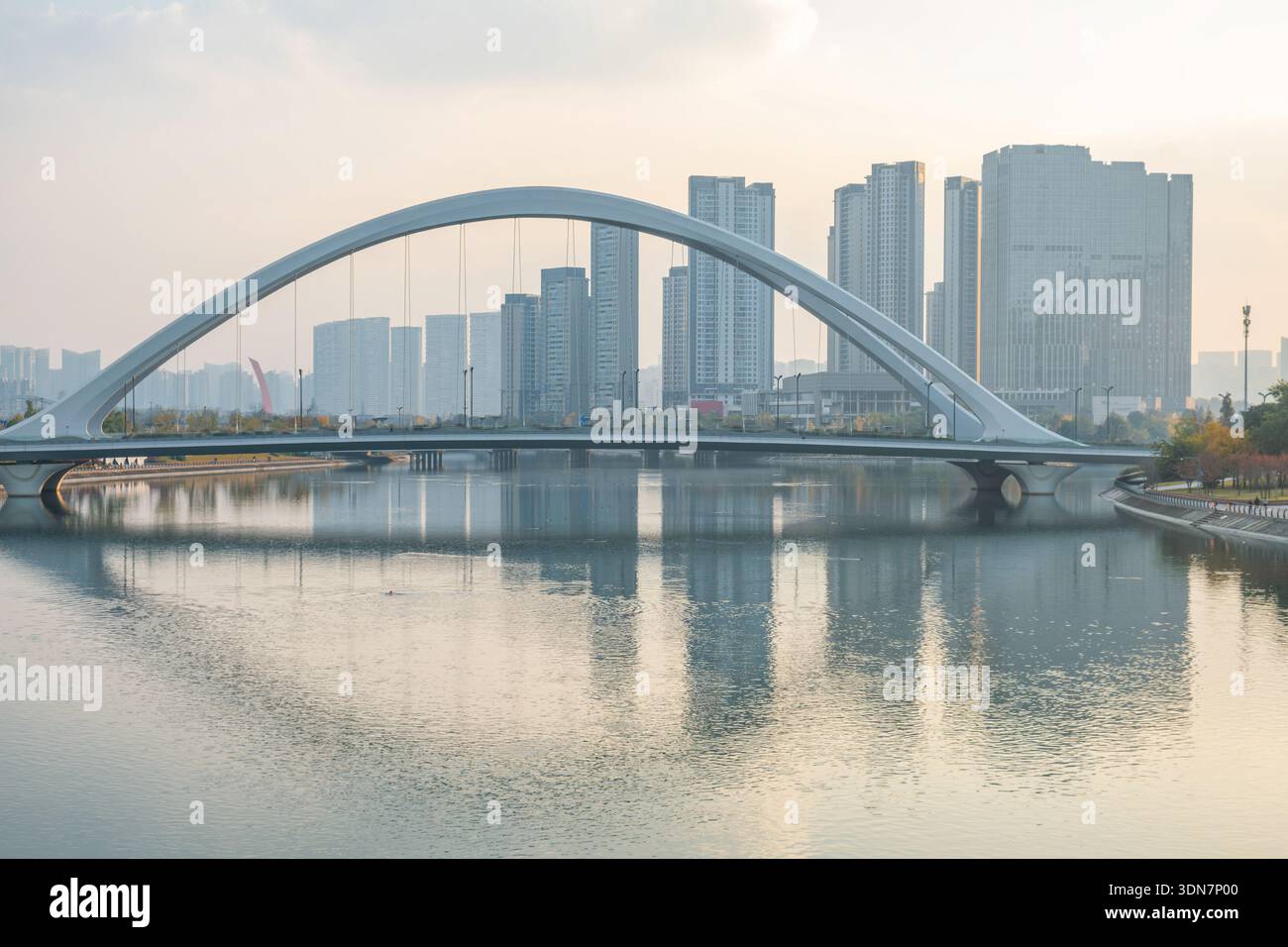 Modern arch bridge spanning calm hi-res stock photography and images ...