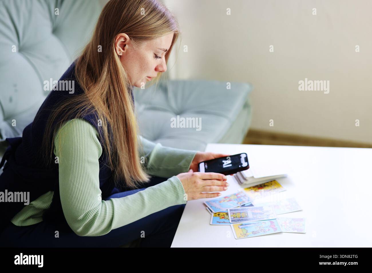 Modern tarot reading interpreted by artificial intelligence at home Stock Photo