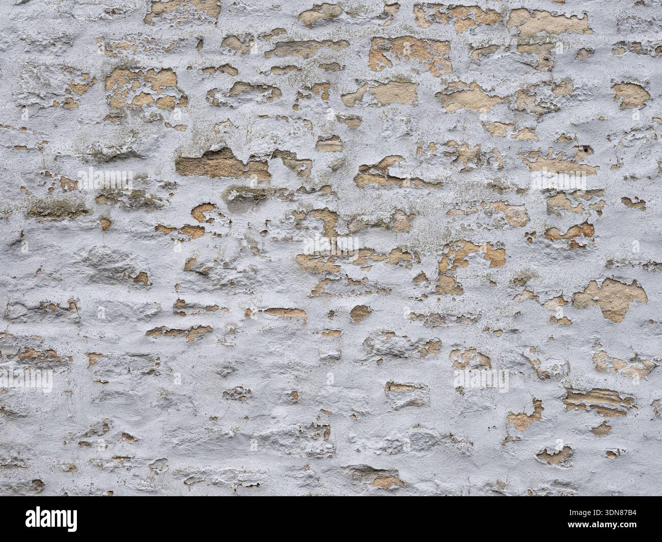 Vintage limewashed masonry close up For textured backdrop wallpaper Stock Photo