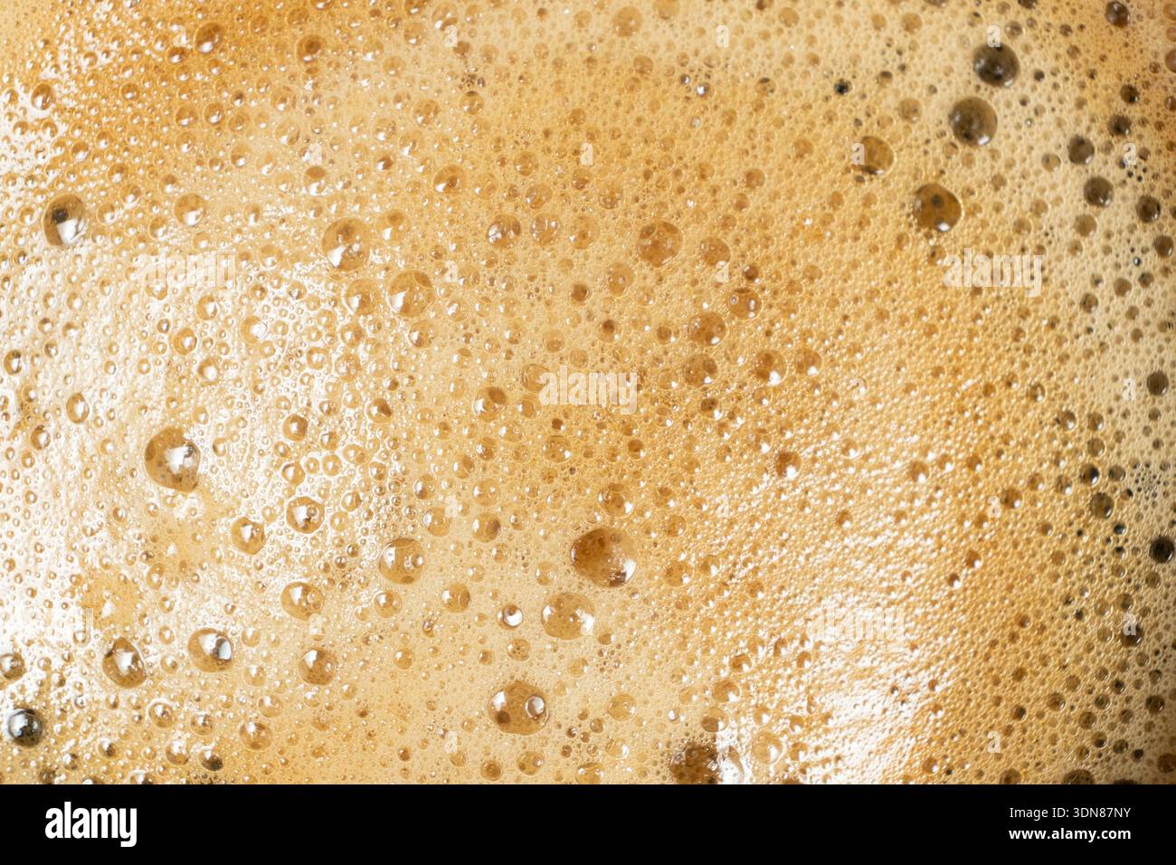 Brown and gold coffee bubbles texture for culinary background Stock Photo