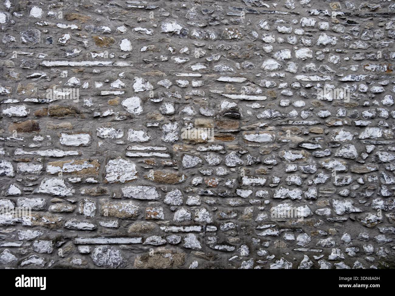 Weathered wall surface showing age and texture. Stock Photo