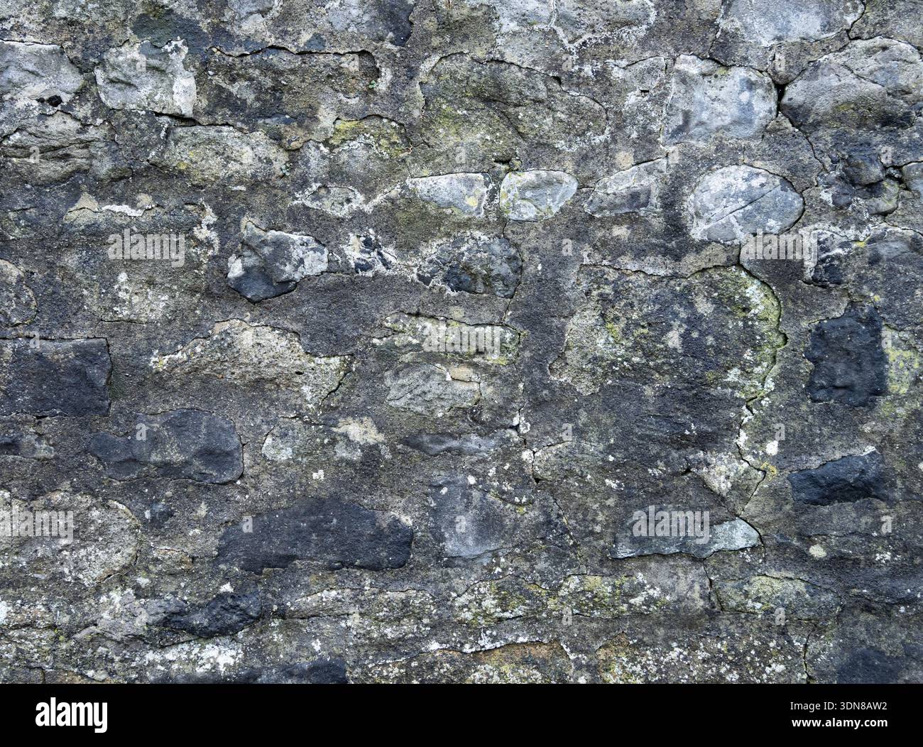 Old exterior wall with subtle mineral staining. Stock Photo
