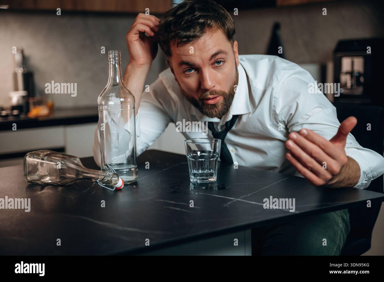 Disheveled man beard sits hi-res stock photography and images - Alamy