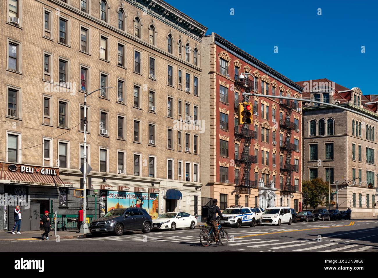 New York, NY, United States -A street corner in the Harlem neighborhood Stock Photo