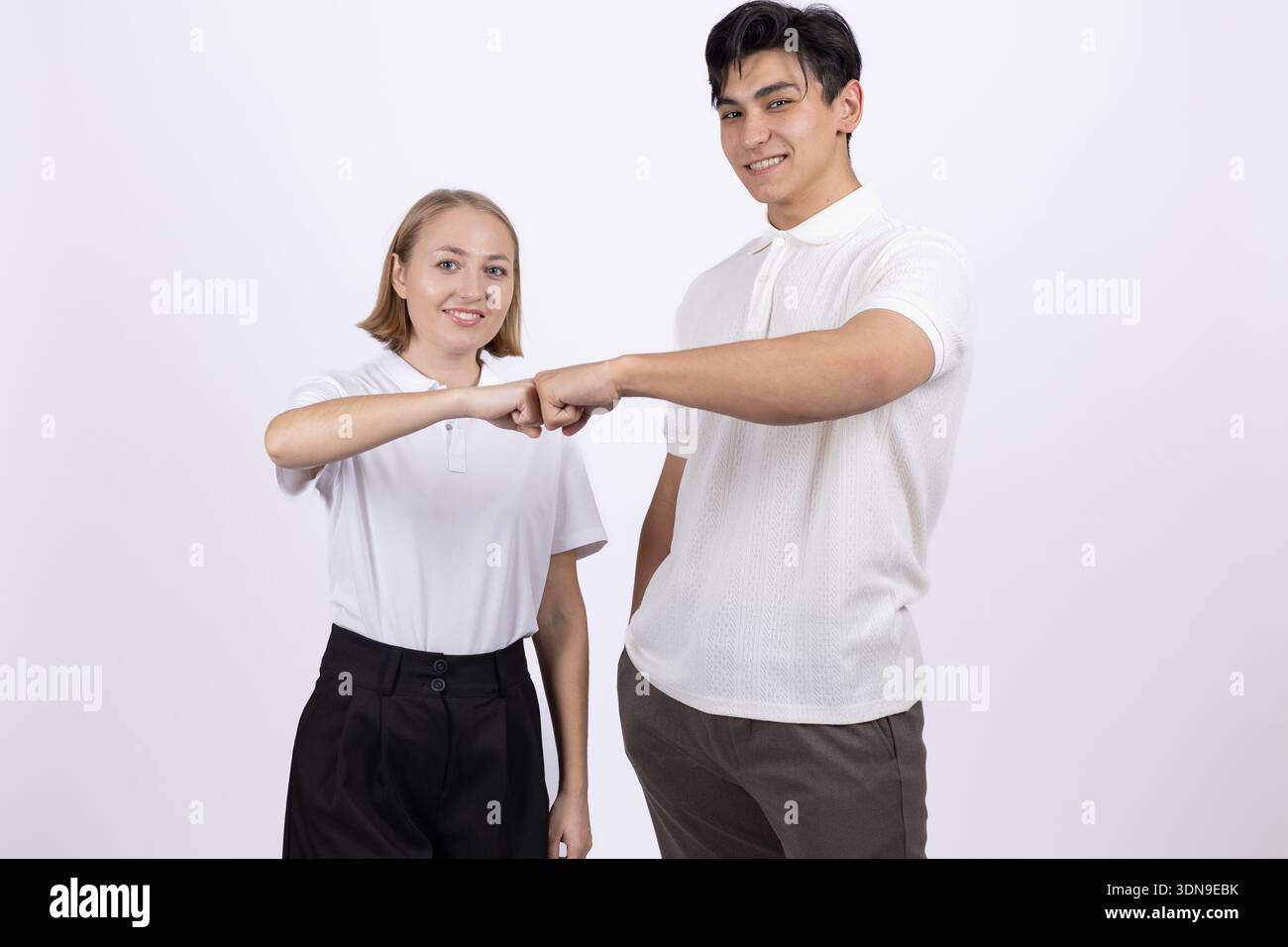 Young couple making heart shape with their hands Stock Photo - Alamy
