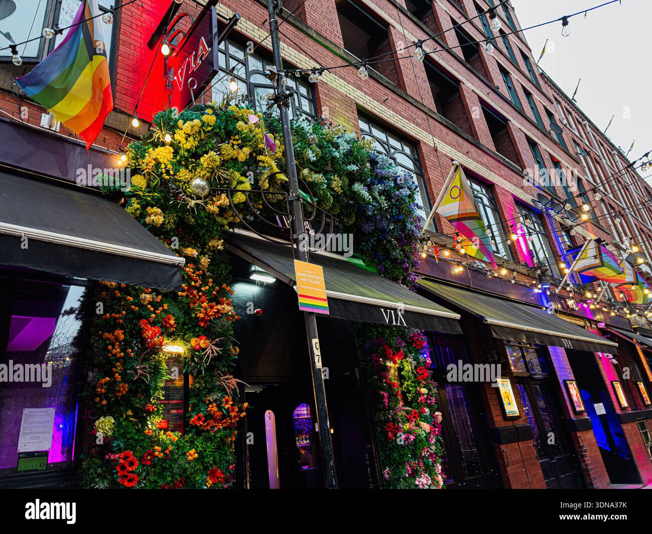 Dna Storefront Manchester, UK - January 22, 2026: Vibrant storefront in Manchester ...