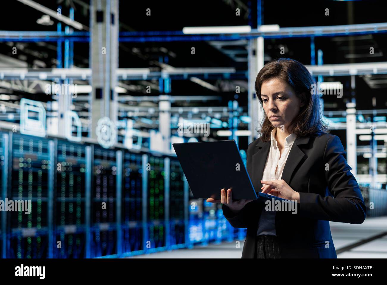 Maintenance, laptop and engineer in data center, VFX compositing overlay. Blue wireframe lines, server farm rackmounts, cloud computing, worker doing system checkup with notebook Stock Photo