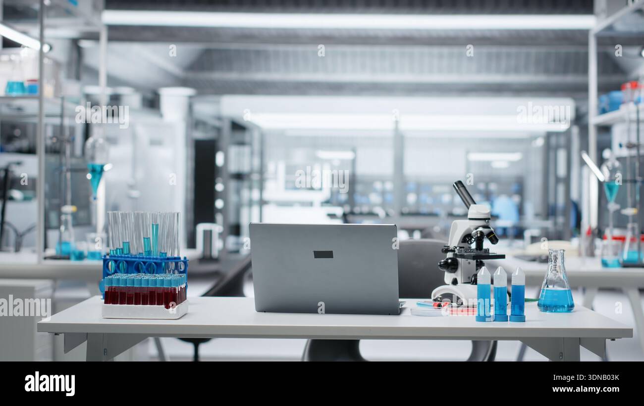 Sterile empty medical laboratory workspace featuring test tube racks on ...