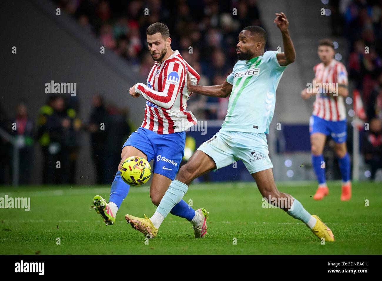 Atletico de Madrid's David Hancko (L) and Real Betis Balompie's Cedric ...