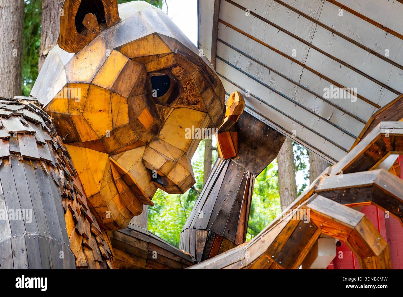 Giant wooden troll sculpture by Danish artist Thomas Dambo at the