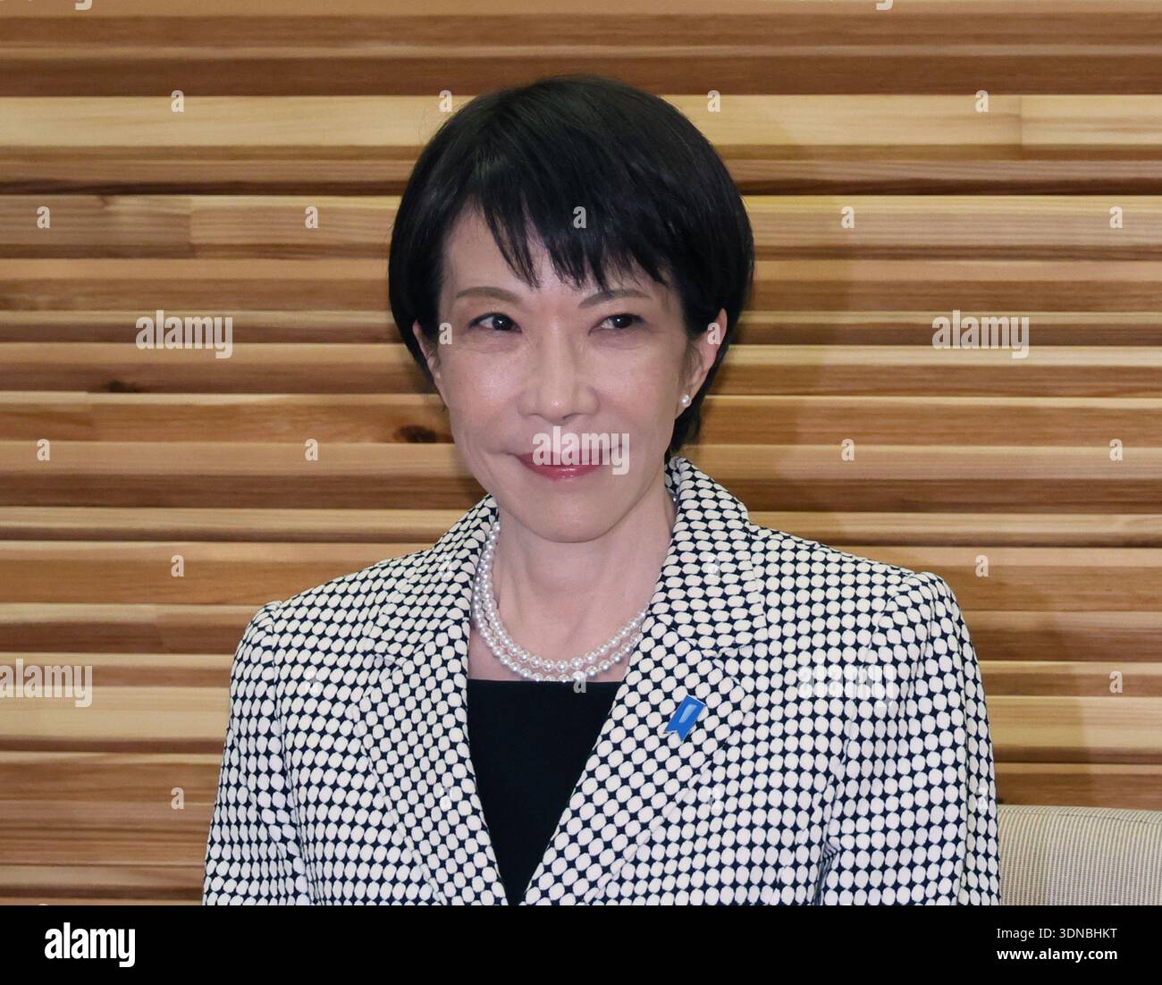 Japanese Prime Minister Sanae Takaichi (C) attends a cabinet meeting at ...