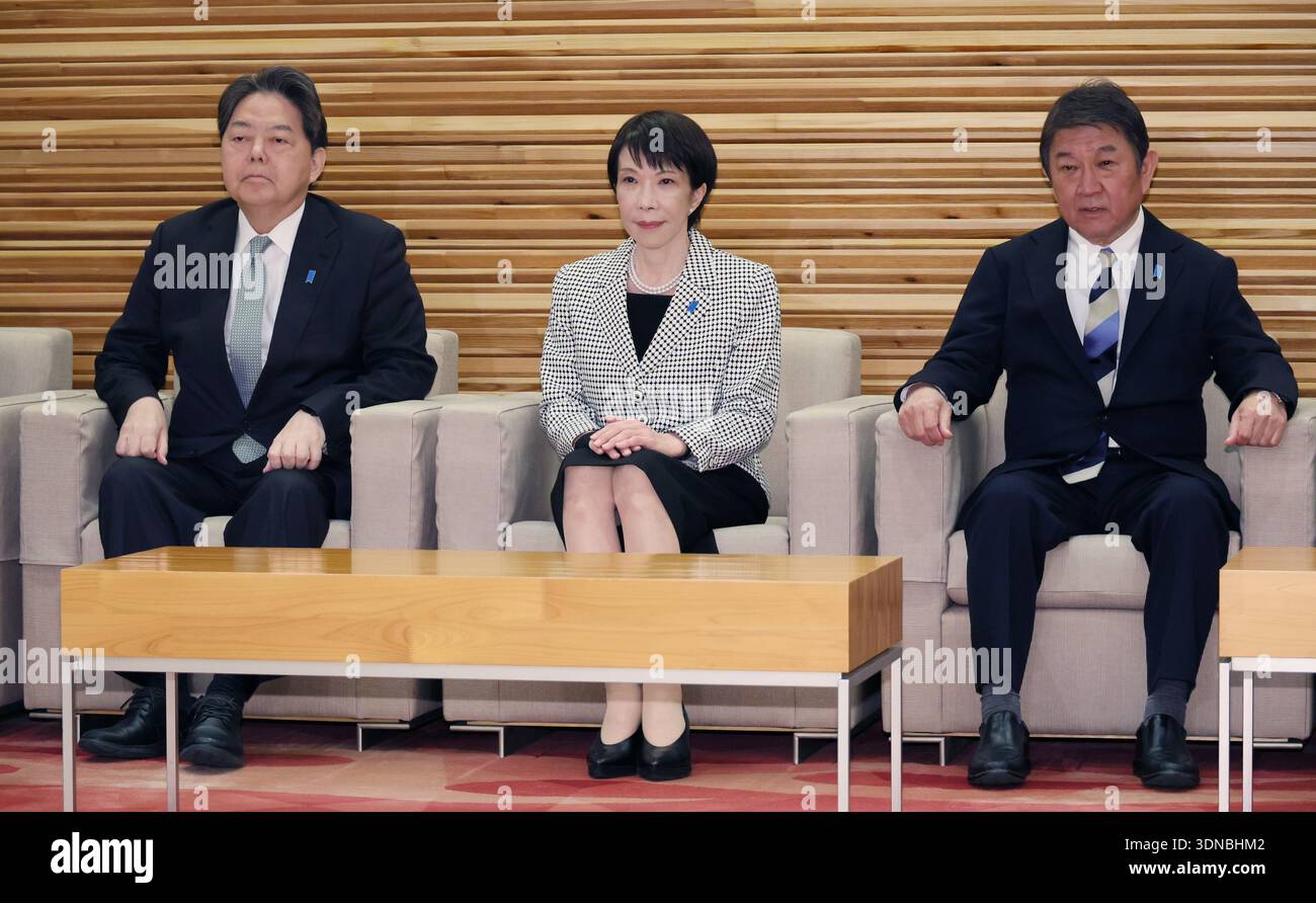 Japanese Prime Minister Sanae Takaichi (C) attends a cabinet meeting at ...