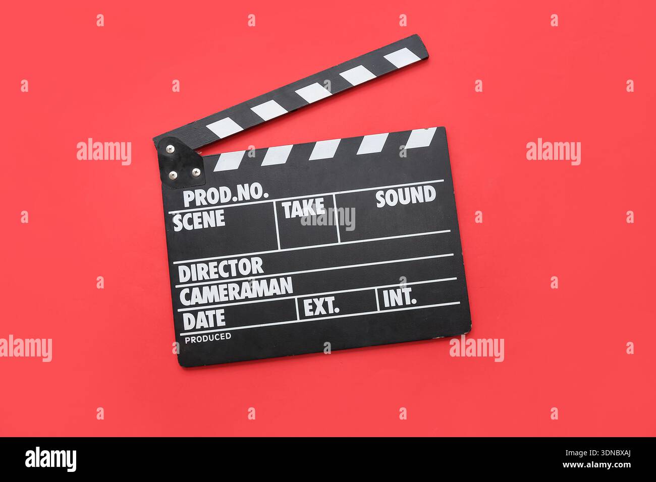 Movie clapper on red background Stock Photo