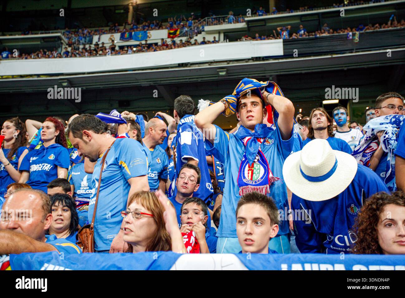 Getafe CF fans show their lament and dejection after their team's defeat in the 2007 cup final held at the Bernabeu stadium in Madrid, Spain. Stock Photo