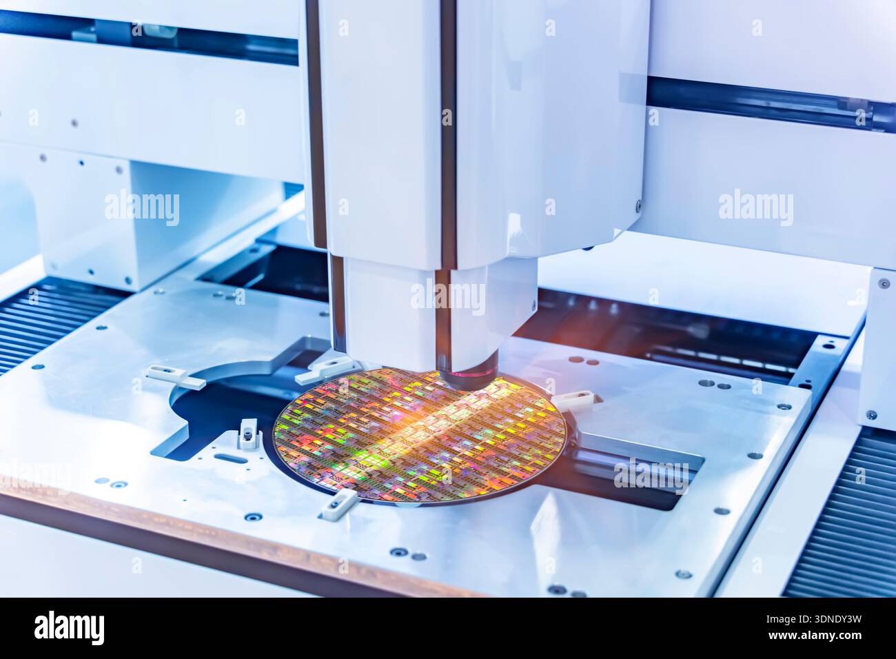 Silicon wafer with semiconductor microchip on machine process examining testing in microscope. Stock Photo