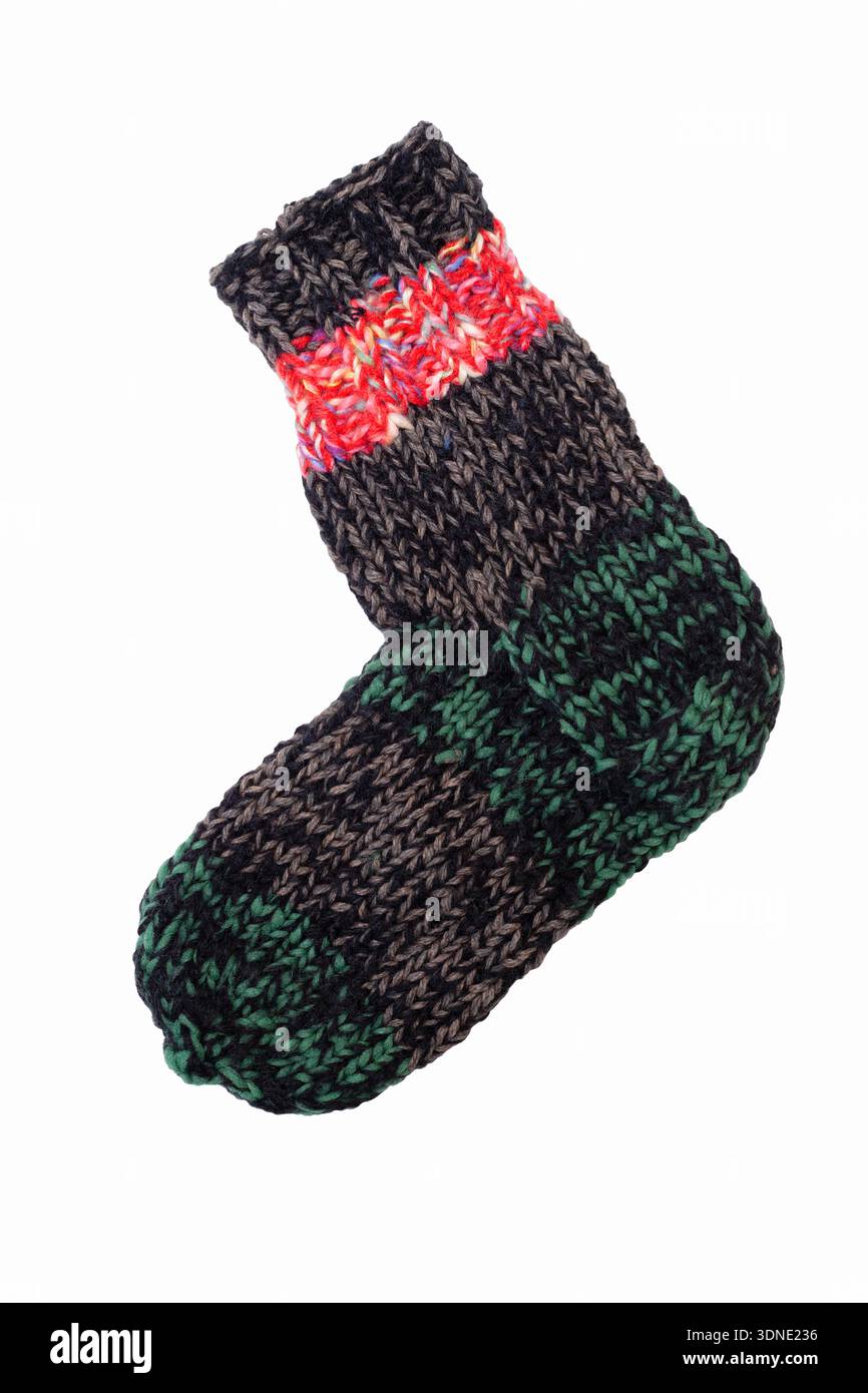 Knitted wool, handmade sock on a white background Stock Photo