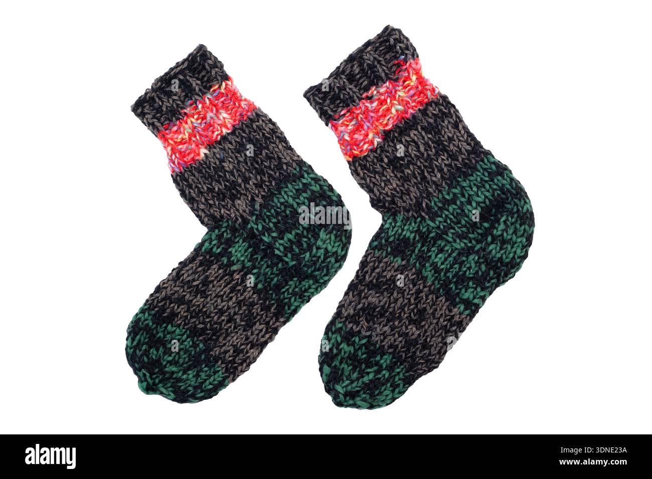 Knitted wool, handmade socks on a white background Stock Photo