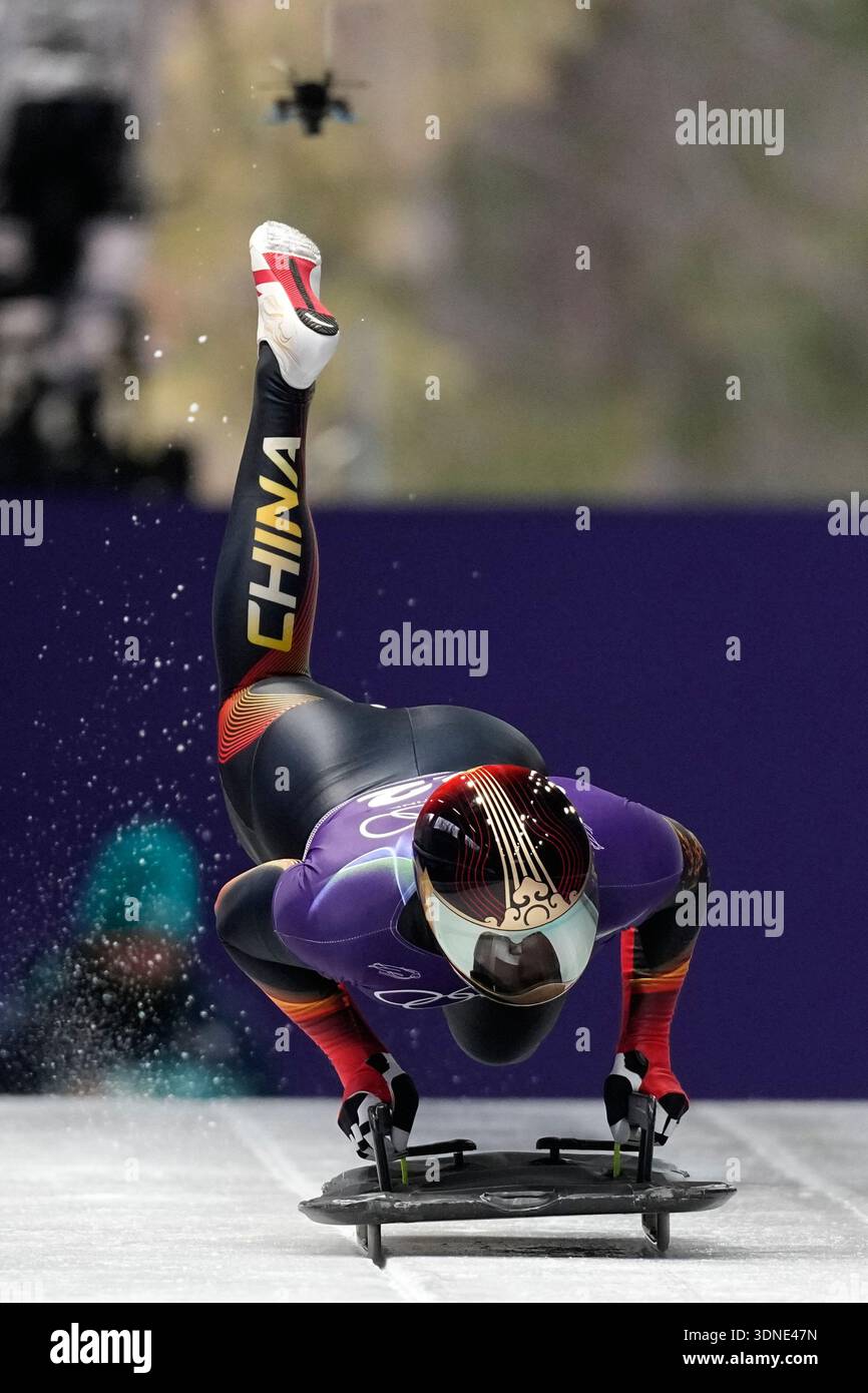 A drone follows China's Chen Wenhao as he starts for a men's skeleton ...