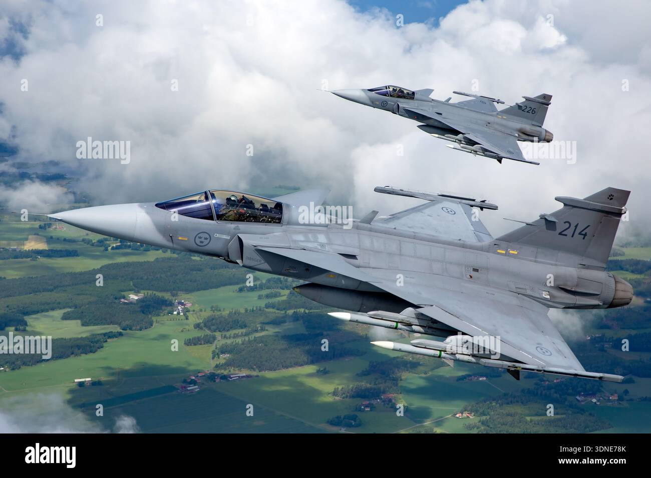 Small Forward Fuselage This air‑to‑air image captures two Swedish Air Force Saab JAS 39C ...