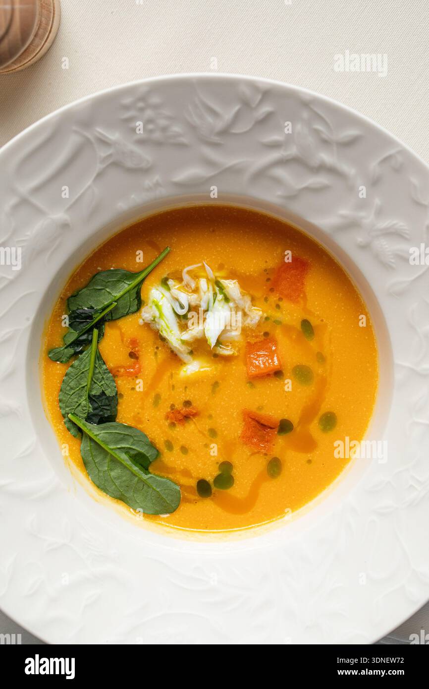Creamy vegetable soup with herbs and cream Stock Photo - Alamy