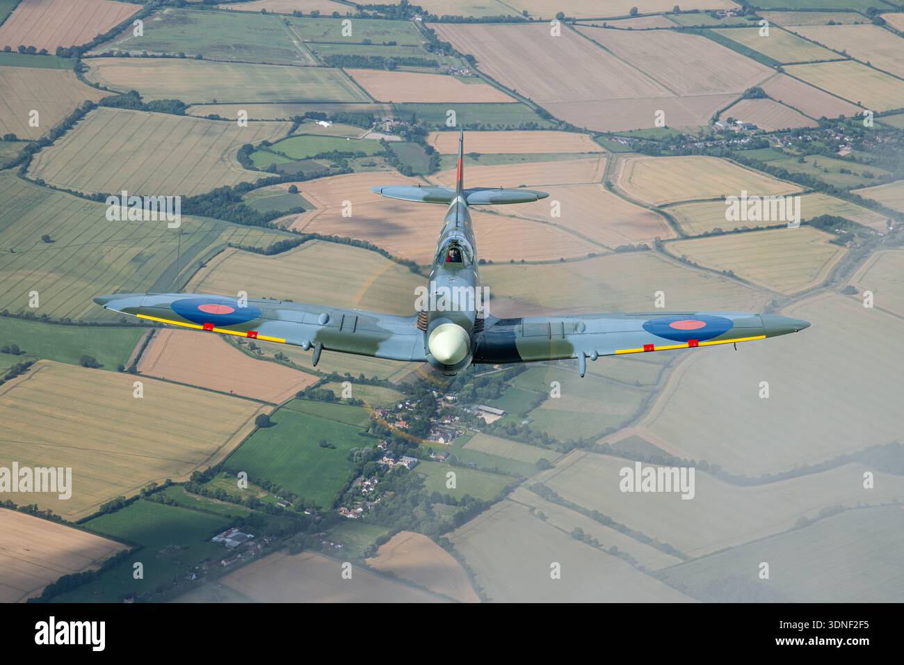This air‑to‑air close‑up shows a Supermarine Spitfire LF5C single‑seat ...