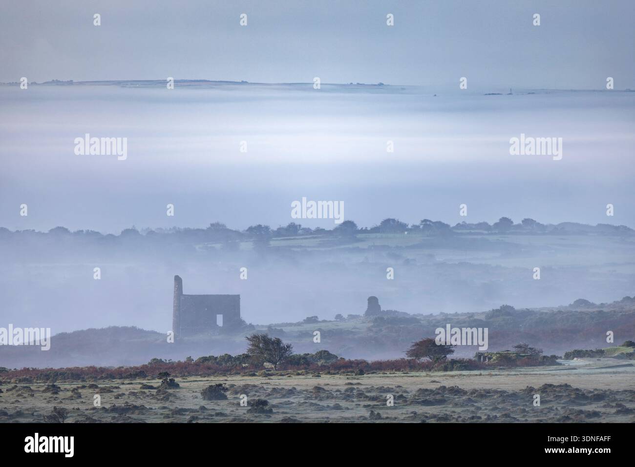 Mist shrouds New Phoenix Mine on Bodmin Moor, Cornwall, England.  Autumn (September) 2025. Stock Photo