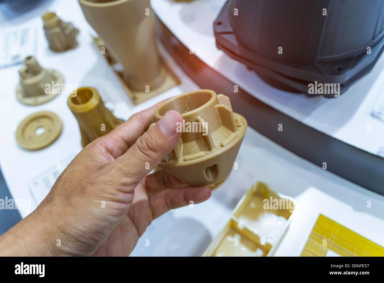 hand with Object printed on 3d printer close-up Stock Photo