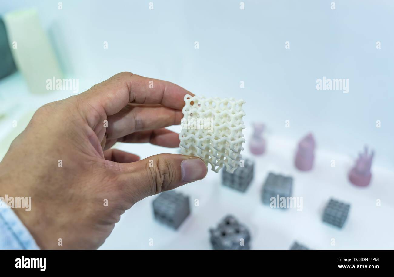 hand with Object printed on 3d printer close-up. Stock Photo