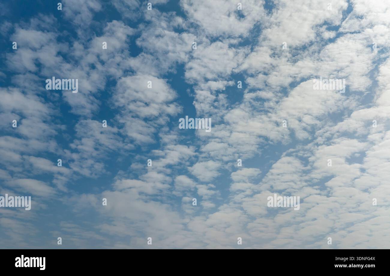 blue sky background with tiny clouds Stock Photo
