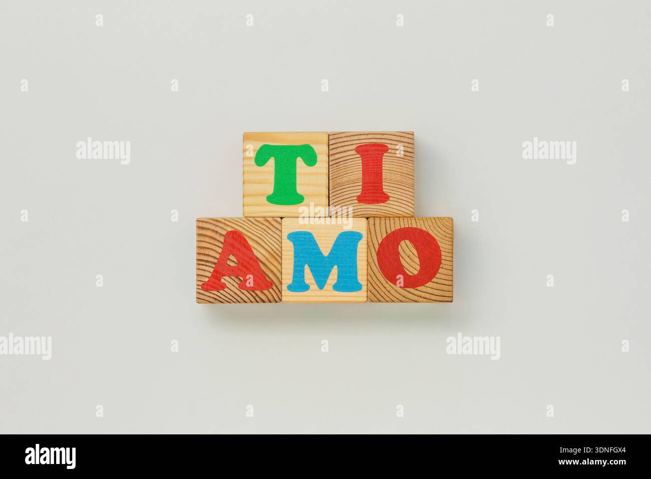 I Love You in Italian TI AMO, Spelled with Wooden Cubes Stock Photo