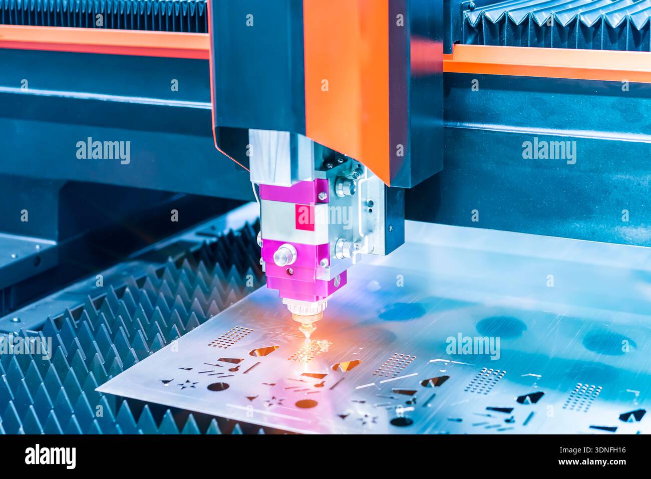laser cutting machine controller in factory Stock Photo