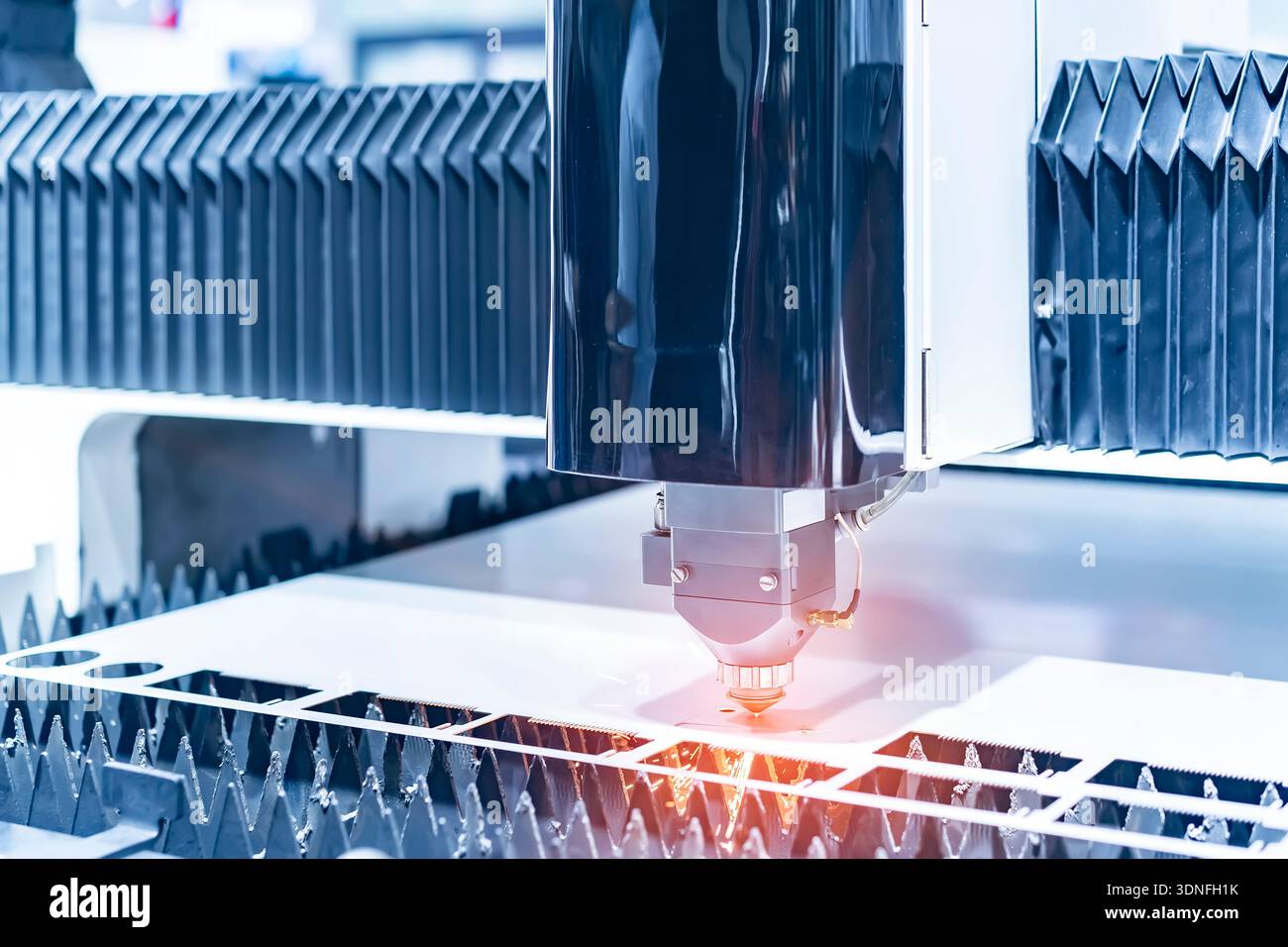 laser cutting machine controller in factory Stock Photo