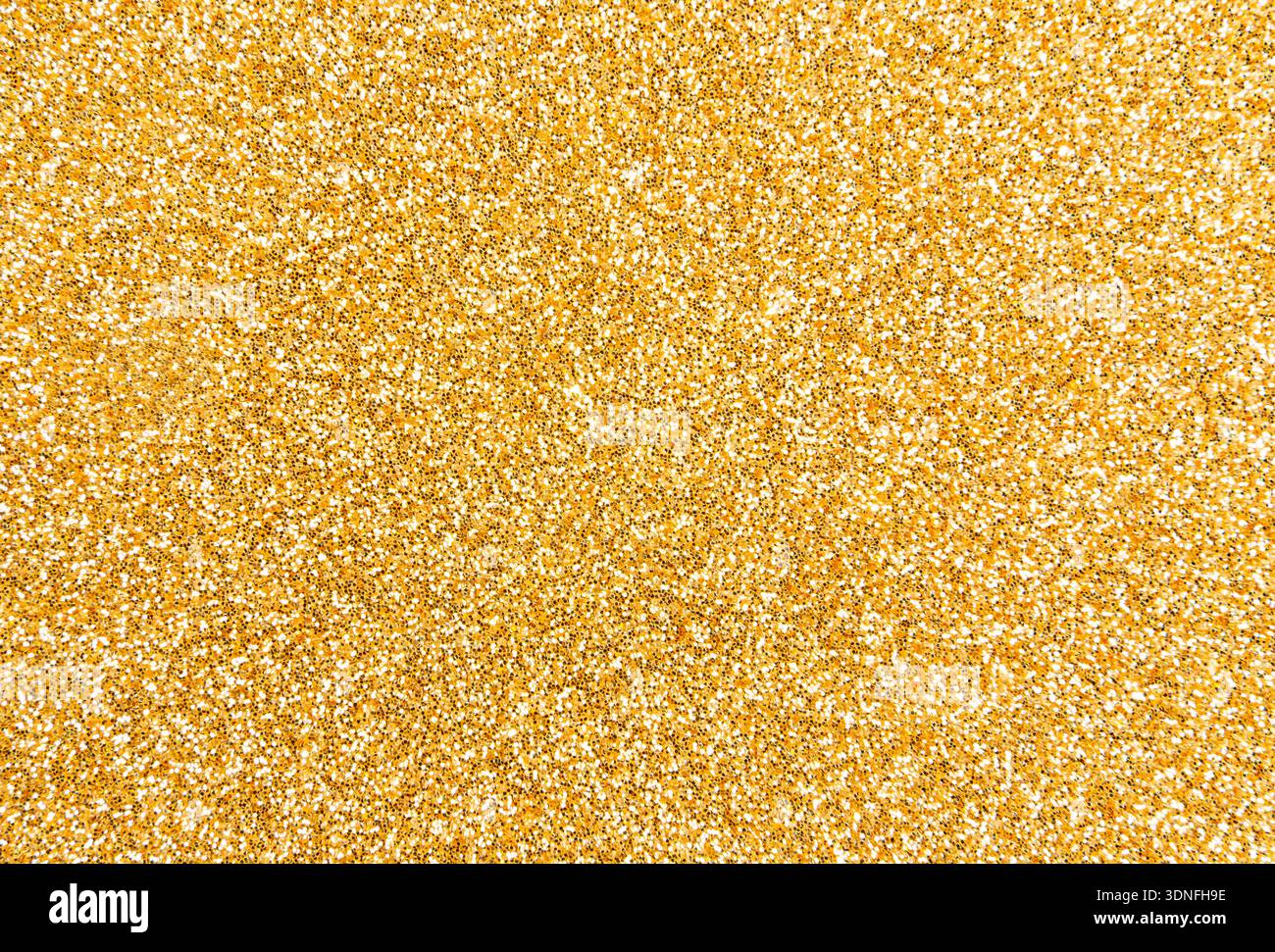 Golden glitter texture background with sequins and sparkles Stock Photo