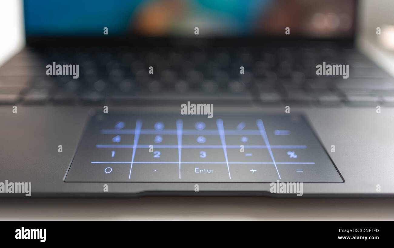 Backlit numeric keypad in a modern latest generation laptop. Stock Photo