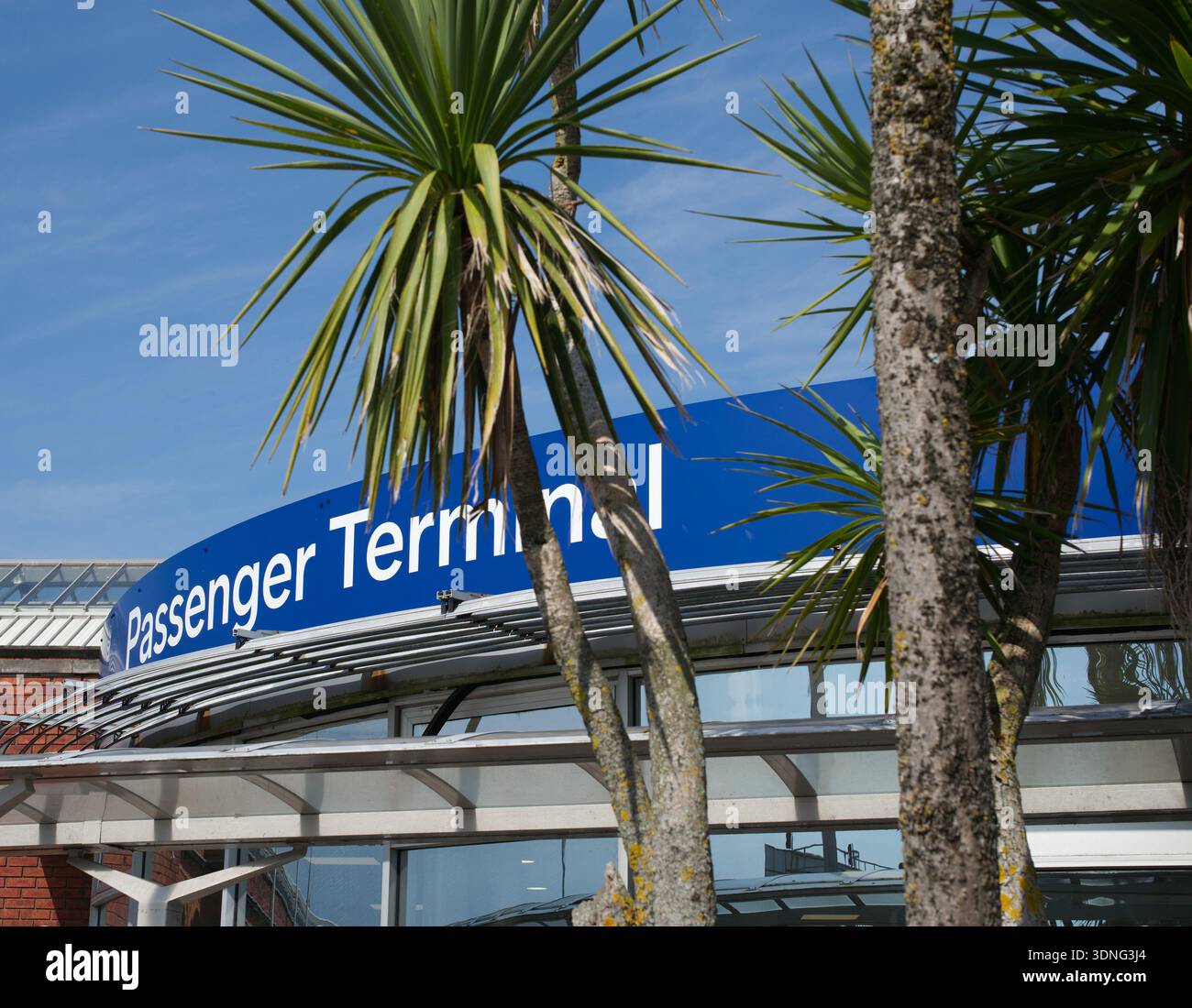 Holyhead ferry and train passenger terminal entrance with palm trees ...