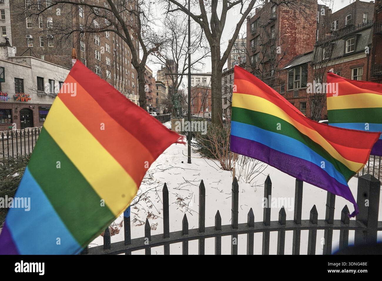 Small Pride flags adorn a fence in the Stonewall National Monument ...