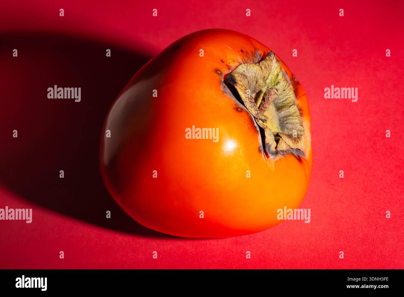 Red persimmon fruit hi-res stock photography and images - Alamy