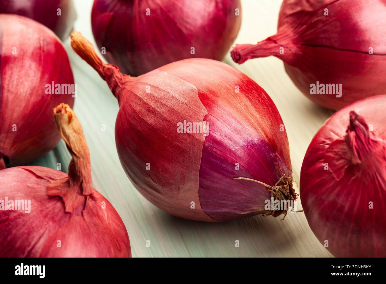red onion on wood background Stock Photo