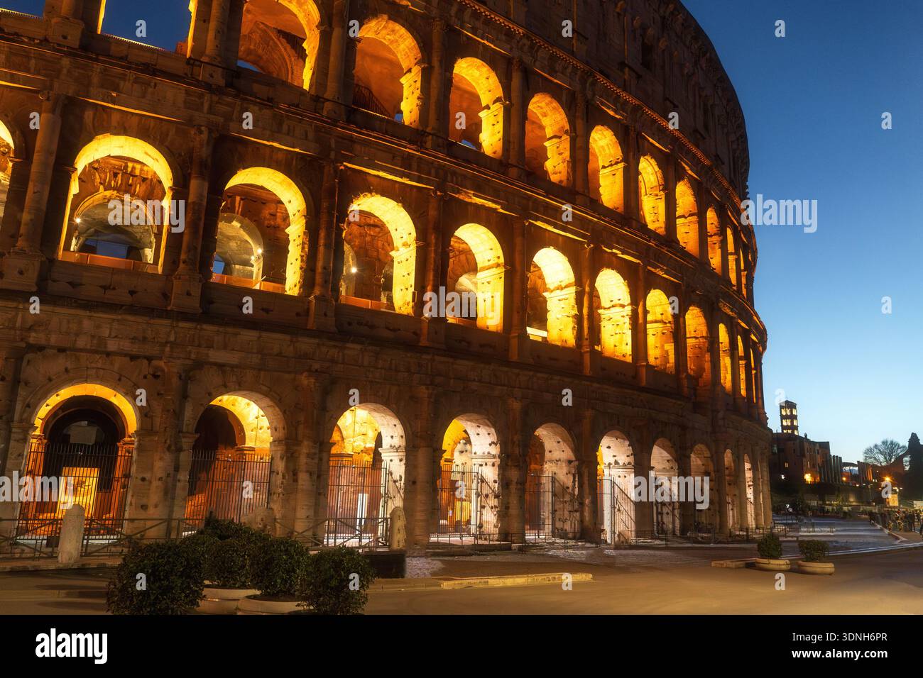 Evening cityscape of ancient travertine walls and Roman brickwork
