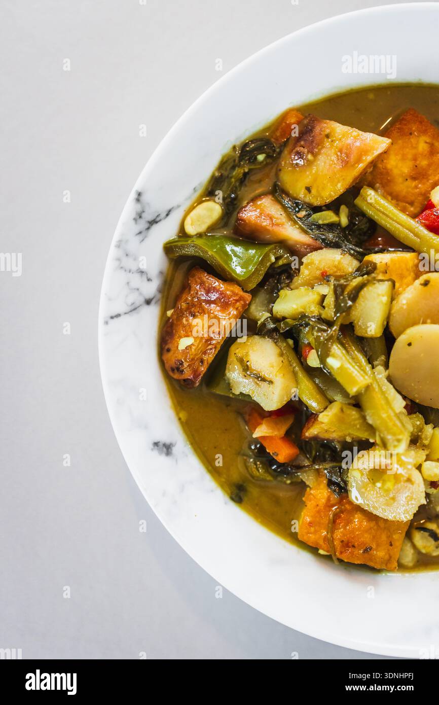 vegetarian green curry made with tofu and mixed vegetables in a creamy ...